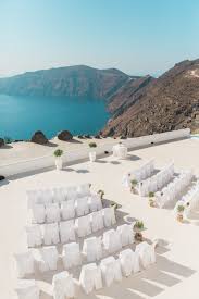 Elegant Santorini Wedding At Rocabella Hotel With Olive Tree Decor Jesus Peiro Wedding Dress Santorini Wedding Destination Wedding Locations Wedding Venues