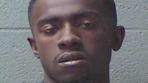 Two men arrested moments after armed robbery call, one still sought