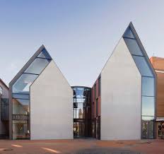 The New Building For The Financial And Service Centre Of The Volksbank Is Situated At The Central Pedestrian Modern Architecture Architecture Roof Architecture