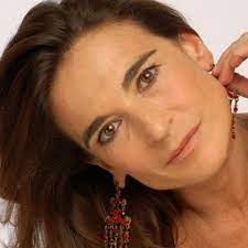 She made her professional debut with the theatrical company teatro libero, and had her breakout in 1974. Lina Sastri Womex