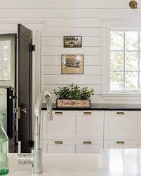 His and hers navy blue vanity with gold hardware and polished chrome fixtures. Find And Save Ideas About Shiplap In Kitchen On Pinterest See More Ideas About Modern Counterto Shiplap Kitchen White Cottage Kitchens White Cottage Kitchen