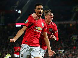 Manchester united manager ole gunnar solskjaer greets mason greenwood at the end of their english premier league football match against burnley at the old trafford stadium in manchester, england. Ole Gunnar Solskjaer Reveals His Plans For Mason Greenwood S Development At Man Utd 90min