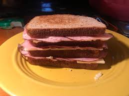 Look at my majestic quadruple layer sandwich. Aint she a beauty. You may  be like why is it on shitty food porn and thats because its just ham and  Swiss and bread