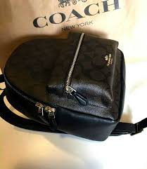 Coach backpack purse for women. F58315 Mini Charlie Backpack In Signature Coated Color Imitation Gold Brown Black Style Code F58315 Imaa8 Size 7 1 2 L Coach Backpack Bags Purses And Bags