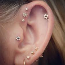Constellation Piercings Consist Of A Collection Of Small Earrings Placed Like Stars Around Your Earlobe Cool Ear Piercings Pretty Ear Piercings Unique Ear Piercings