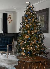 Beautiful, affordable christmas tree baubles and christmas tree decorations available online and lots more instore. Blue And Gold Christmas Tree With Blue Butterflies Gold Christmas Tree Decorations Christmas Tree Themes Gold Christmas Tree