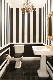 Whether you want inspiration for planning a powder room renovation or are building a designer powder room from scratch, houzz has 110,261 images from the best designers, decorators, and architects in the country, including knock out kitchen and bath, llc and roomscapes cabinetry and design center. Striped Walls Wallpaper Molding Gold Chandelier Traditional Powder Room Sweet Interior Design