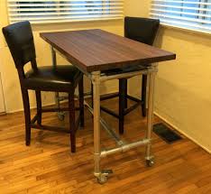 I don't know if a concrete top for the island might be better. Butcher Block Rolling Kitchen Island Helps You Entertain Your Guests Simplified Building