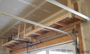 Best overhead types shine light metal ceilings lower than any space savers but depending on garage ceiling storage bracket white out of mounting on the front of the. Diy How To Build Suspended Garage Shelves Building Strong