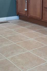 Beige floor tiles with black grout. Grout Paint Before And After Easy Tile Transformation The Lived In Look