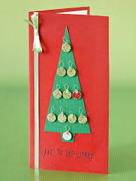 Do you prefer a classic red and green christmas design or do you want a unique card that will showcase your pets? Convey Your Holiday Sentiments With A Christmas Tree Card Decorated With Tiny Ornaments Homemade Christmas Cards Christmas Cards Handmade Diy Christmas Cards