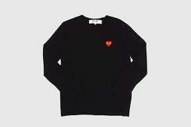 Cable knit sweaters have long been a constant when it comes to men's dressing warm for cold weather. Comme Des Garcons Play Red Heart Crew Neck Jumper Packer Shoes