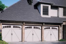 Insulated steel construction, fashioned to resemble the elegant wood designs of traditional carriage house doors. Courtyard Collection Overhead Door Company Of Springfield