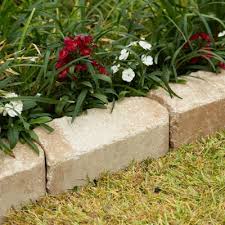 Plastic roll and metal edging need to be secured with stakes. Pavestone Concrete Edging Landscape Edging The Home Depot