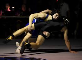 Decatur wrestling handles Queen Anne's to win at home