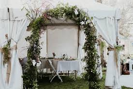 Create a runner with leaves, vines and lemons for a mediterranean flair. An Elegant Garden Backyard Rehearsal Dinner Party The Anastasia Co