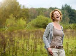 Portrait Of A Beautiful Woman Laughing In The Countryside Stock Photo,  Picture and Royalty Free Image. Image 31616444.