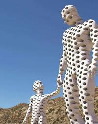 The Statue Of The Son Was Made With Pieces Removed From The Statue Of The Father Representing The Parents What They Go Through Father And Son Statue Pictures