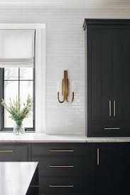 In 2021 you'll see a mix of more traditional looks and modern takes on kitchen cabinets. Grey Kitchen Cabinets Brass Pulls Design Ideas