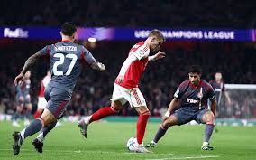 Olympiakos gives Arsenal a hard time before succumbing to its host
