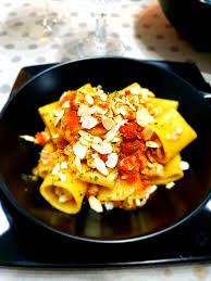 Calamarata is a variety of italian pasta that is cut in the shape of a thick ring. Calamarata Con Gallinella E Scorfano