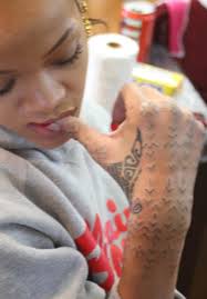 Rihanna tattoo design on wrist: Rihanna Gets Her Kiwi Tattoo Covered By Another Nz Herald