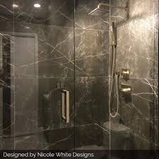 We tiled our bathroom shower with white subway tiles and you can too! Ayana 24x48 Semi Polished Porcelain Tile Dark Tile Shower Marble Shower Walls Large Shower Tile