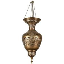 Brass light fixtures exist in many homes and are not always complimentary to a room's decor. Moroccan Moorish Brass Hanging Light Fixture In 2021 Hanging Lights Hanging Light Fixtures Moroccan Light Fixture