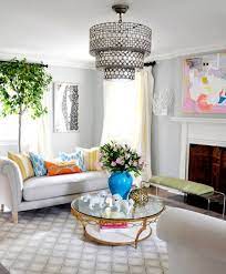 A table brimming with decorations gives the entire space a cozy and romantic look. 37 Best Coffee Table Decorating Ideas And Designs For 2021
