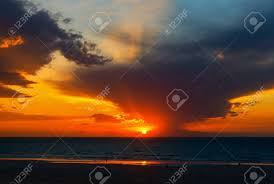 Leave a comment under any picture! A Beautiful Scenery Of The Sunset Reflected In The Sea Great Stock Photo Picture And Royalty Free Image Image 154670716