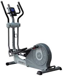 Woman working out with dumbbells near her exercise bike. Proform Crosstrainer Space Saver 700 Amazon De Sports Outdoors