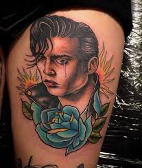 Tattoos D Mug Johnny Depp With Blue Rose Johnny Depp Tattoos Ideas Tattoos Johnny Depp Tattoos