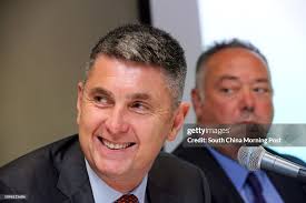 Ben McLaughlin, of Baker & McKenzie; and Philip Pfrang, of Deloitte,...  News Photo