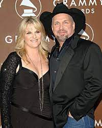 Before trisha, garth was married to sandy mahl. Happy Birthday Mr Brooks Snakkle Celebrates Garth Brooks S 50th Birthday With A Look Back At His Career Garth Brooks Country Music Singers Garth