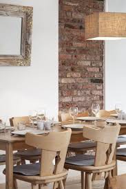 Wie Lebt Es Sich Mit Einer Backsteinwand Wir Haben Nachgefragt Backsteinwand Backstein Esszimmer Gestalten