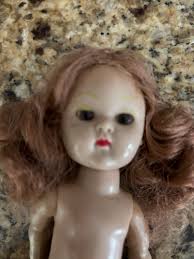 The Ginny Bride has painted lashes. (1954)