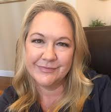 What public beach in Destin has 100% clear waters?