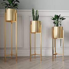 Shop our plant pots selection from the world's finest dealers on 1stdibs. Preorder Gold Pot Stand Planter Plant Stand Plant Not Included Gardening Pots Planters On Carousell