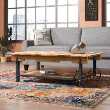 Rustic pine wood cart coffee table antique wash iron wheels 56 long. Industrial Coffee Table With Wheels Ideas On Foter