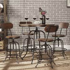 Introduce Simplicity And Transitional Functionality With This Modern Industrial Style Round Bar Table Set Offere Pub Table Sets Pub Style Table Pub Dining Set