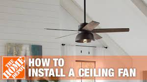 Install a new ceiling fan mounting box: How To Replace Or Install A Ceiling Fan The Home Depot Youtube