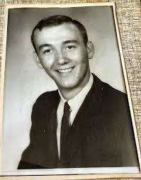 What is the best way to find out who the man is in a 1930s Dayton newspaper  photo?