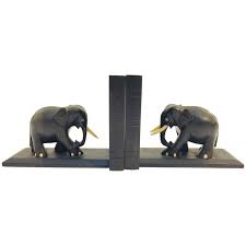 Frequently made of metal, bronze and stone, all elephant bookends available were constructed with great care.elephant bookends have been made for many years, and versions that date back to the 19th century alongside those produced as recently as the 21st century. Ebony Hand Carved Wooden Elephant Bookends For Sale At 1stdibs