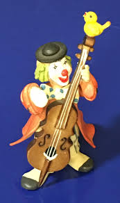 Vintage clown suona BassCello con giallo uccello Anri Toriart italiano  figurine di legno - Etsy Italia