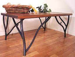 See also the following table for related convertions. Rustic Coffee Tables Woodland Iron Cocktail Coffee Table Black Forest Decor