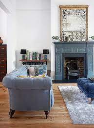 Feb 22, 2021 · in this small grey living room, the use of a mural also expands the space as it stops an expanse of white wall making the room feel boxy. Glamorous Traditional Styled Living Room With Slate Gray Painted Fireplace With Antiq Chesterfield Sofa Living Room Victorian Living Room Blue Rugs Living Room