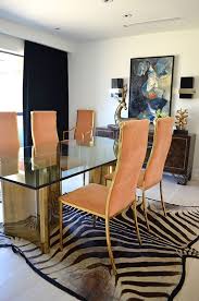 Secluded Sanctuary Glass Dining Table Gold Dining Chairs Interior Design
