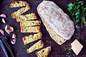 An Extremely Light Air Pocket Riddled Loaf Wonderful For Dunking In Olive Oil Or Splitting Lengthwise To Make A Sand In 2020 Recipes Garlic Bread Garlic Bread Recipe