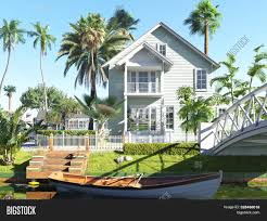 Tropical beach house, hikkaduwa is a true beachfront property superbly located in the middle of the largest and most beautiful bay that runs south of hikkaduwa in the south west of sri lanka. Tropical Beach House Image Photo Free Trial Bigstock