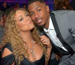 The model shared a photo of herself with cannon on father's day, and he's holding her baby bump. Nick Cannon Says Mariah Carey Is Amazing And A Good Mom To Their Kids